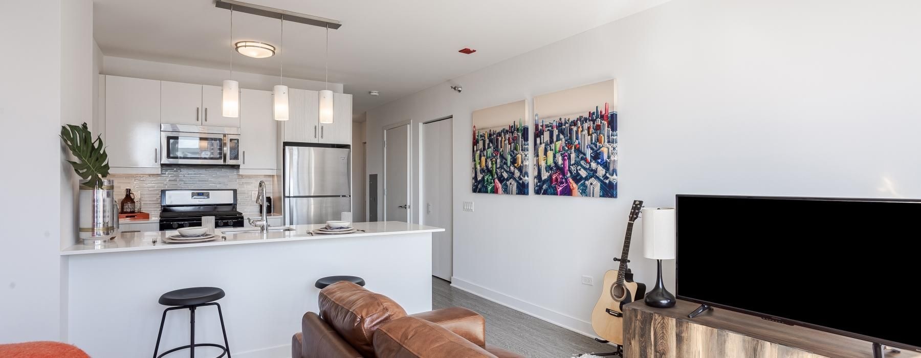 a living room with a couch and a tv
